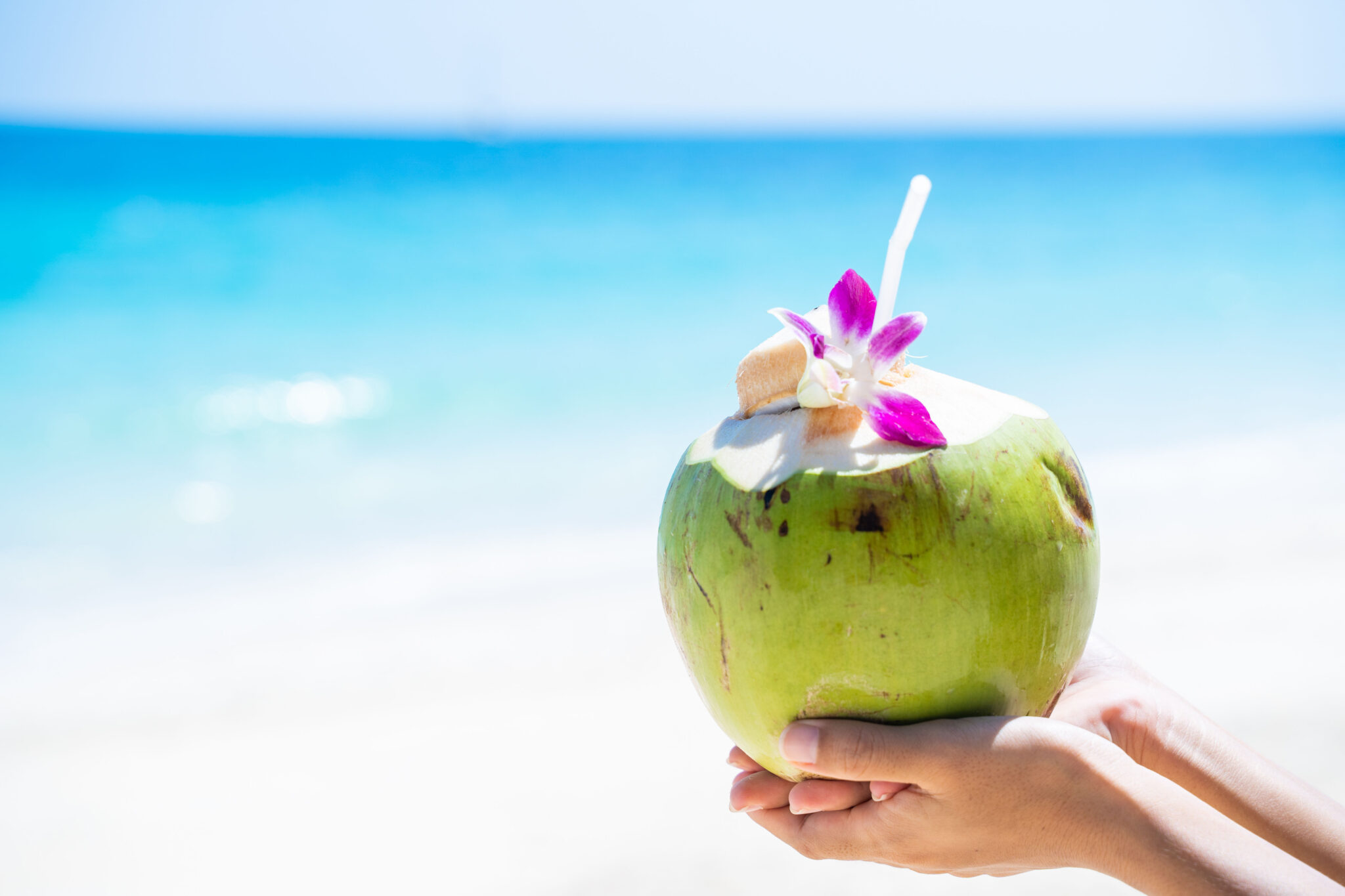 Fresh,Coconut,Juice,On,The,Beach,coconut