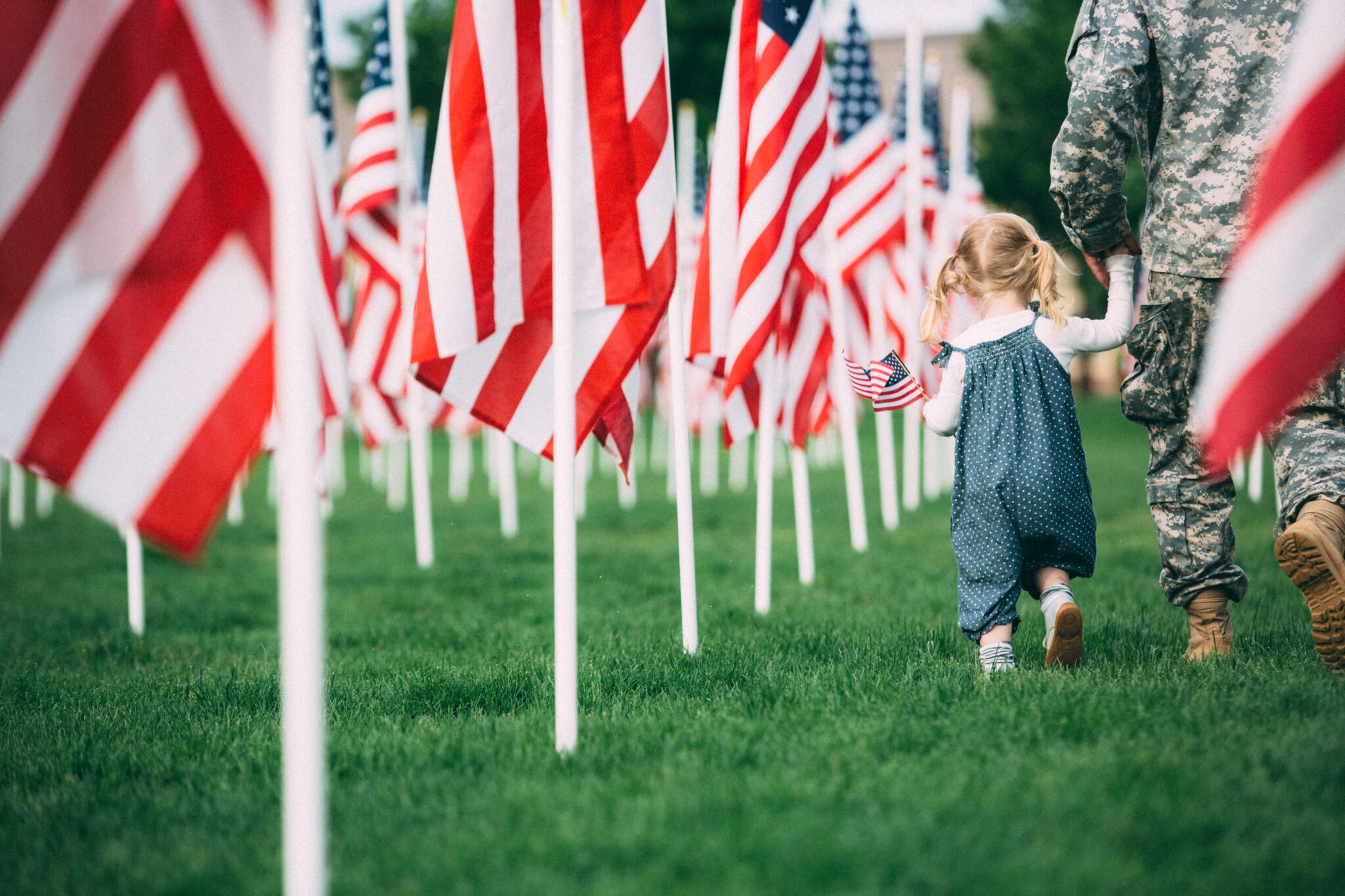 Patriotic Little Girl Walking Her Dad
