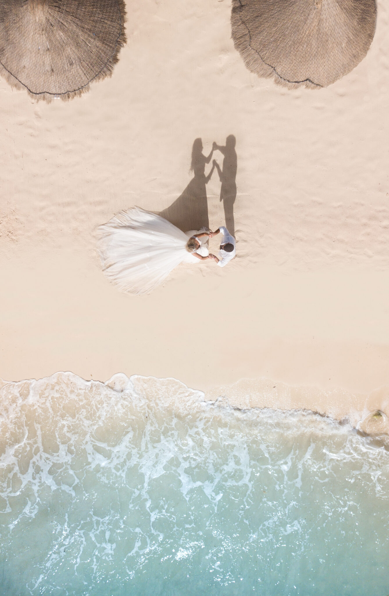 Wedding,Couple,On,A,Beach,,Drone,Top-down,Shoot