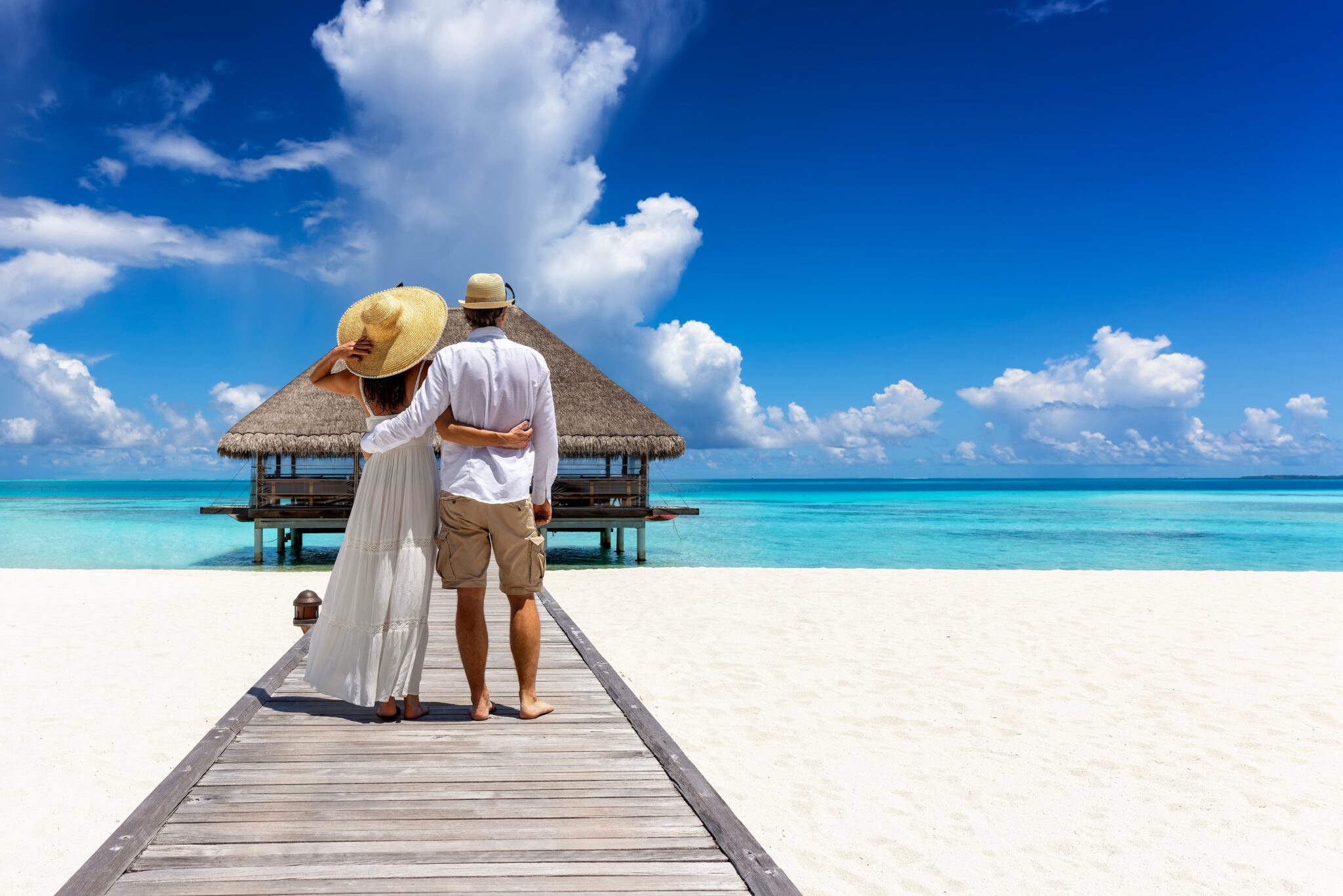 A,Happy,Holiday,Couple,In,Summer,Clothing,Stands,Hugging,On