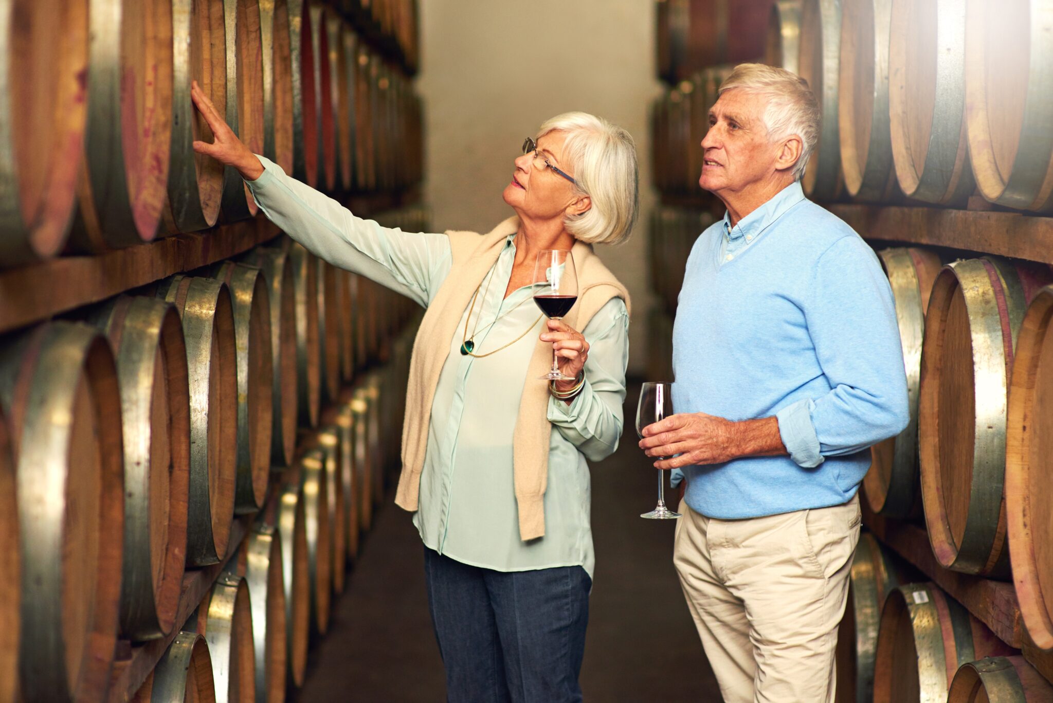 Elderly,Couple,,Cellar,And,Glass,For,Wine,Tasting,,Retirement,And